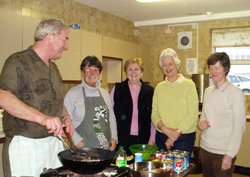 Jan C de Bruijn, Director USPG, with Judith, Grace, Liz and Beryl at the Curry night in Agherton.